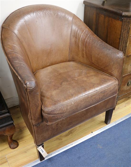 A leather tub chair